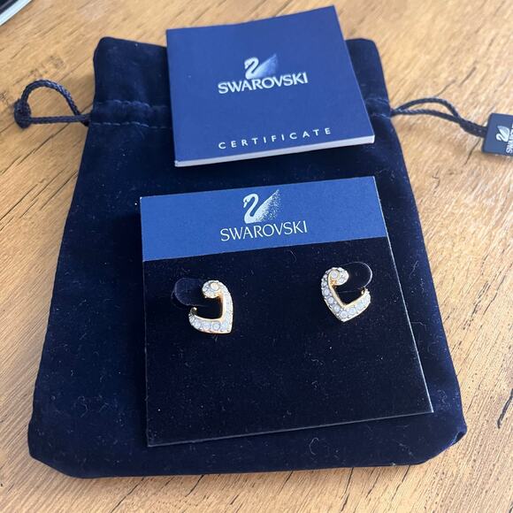 Swarovski Jewelry - Swarovski Gold Tone Crystal Heart Swirl Earrings with Certificate 100% Charity